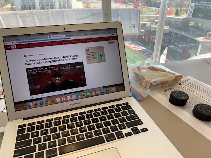 BYO lunch in the Memorial Stadium press box. Going all in "Rounders'' style on Oreo cookies.